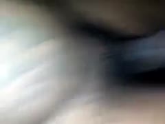 A friend's gorgeous black wife enjoys using a toy to pet herself.